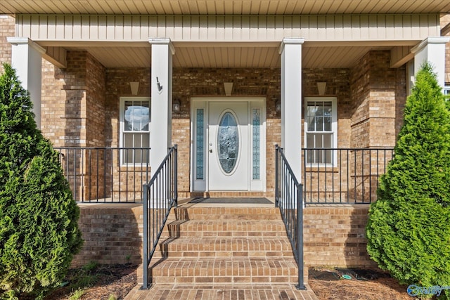 123 Coyote Creek Rd, Meridianville, AL 35759 - entrance to property featuring brick siding and a porch