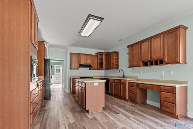 123 Coyote Creek Rd, Meridianville, AL 35759 - kitchen featuring open shelves, freestanding refrigerator, under cabinet range hood, a kitchen island, and stainless steel microwave