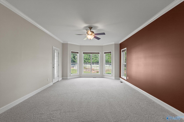 123 Coyote Creek Rd, Meridianville, AL 35759 - carpeted empty room featuring baseboards, a ceiling fan, and ornamental molding