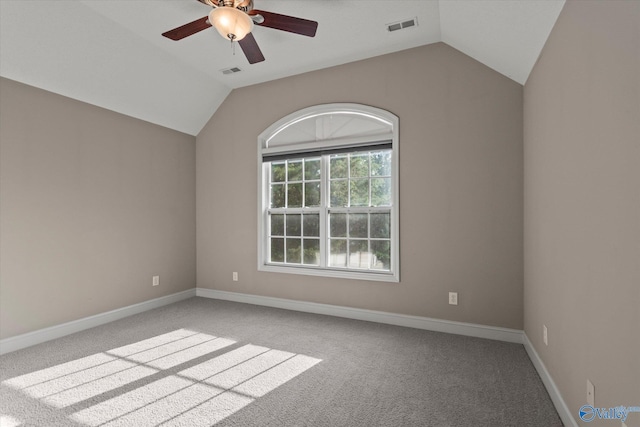 123 Coyote Creek Rd, Meridianville, AL 35759 - carpeted spare room featuring ceiling fan, vaulted ceiling, and baseboards