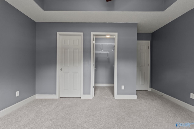 123 Coyote Creek Rd, Meridianville, AL 35759 - unfurnished bedroom featuring a spacious closet, carpet, baseboards, and a closet