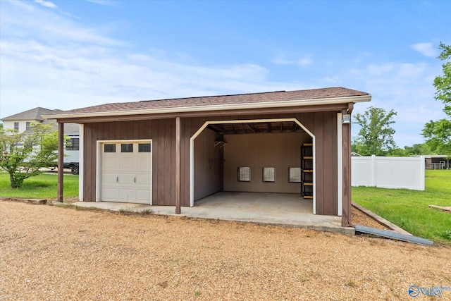 123 Coyote Creek Rd, Meridianville, AL 35759 - detached garage featuring fence