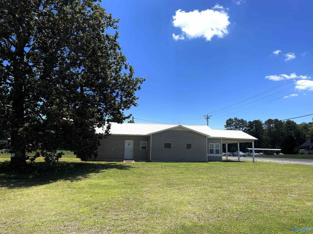 exterior space featuring a front lawn