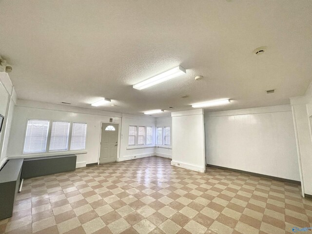 interior space with light tile patterned floors