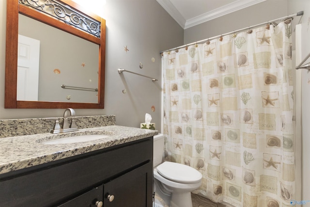 bathroom featuring toilet, vanity, ornamental molding, and a shower with curtain