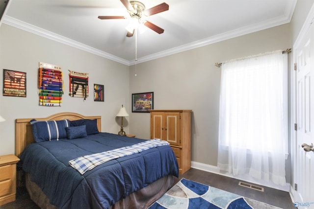 bedroom featuring multiple windows, ceiling fan, ornamental molding, and dark hardwood / wood-style floors