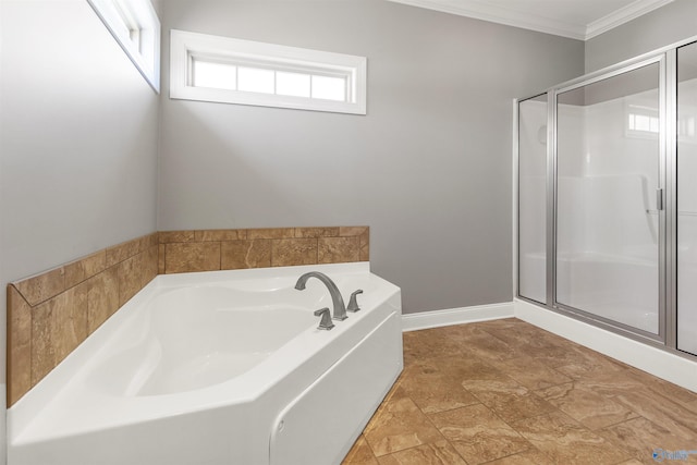 bathroom featuring shower with separate bathtub and ornamental molding