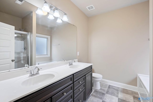 full bathroom featuring independent shower and bath, vanity, and toilet