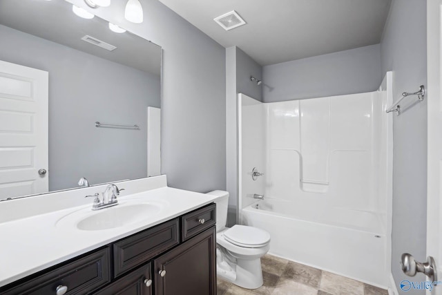 full bathroom with vanity, shower / bathing tub combination, and toilet