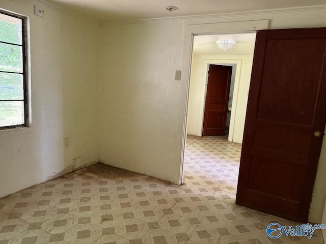 11801 W Gateway Dr SE, Huntsville, AL 35803 - spare room with light floors, ornamental molding, and healthy amount of natural light