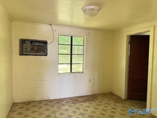 11801 W Gateway Dr SE, Huntsville, AL 35803 - unfurnished room featuring crown molding, a wall unit AC, and light flooring