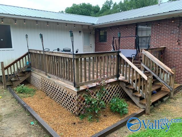 7015 Main St, Gadsden, AL 35903 - wooden terrace with stairway