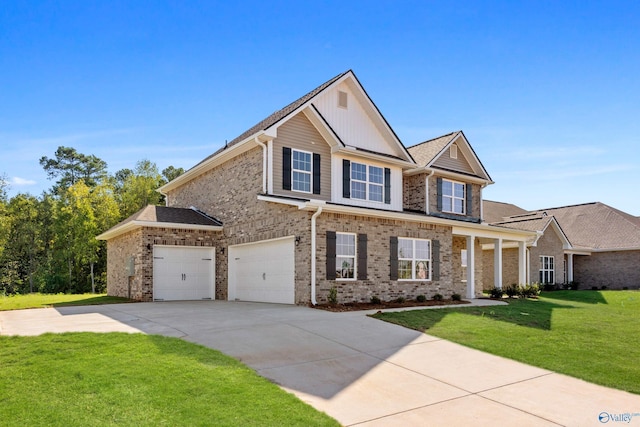 view of front of home featuring a garage and a front lawn