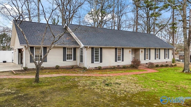 view of front facade with a garage and a front lawn