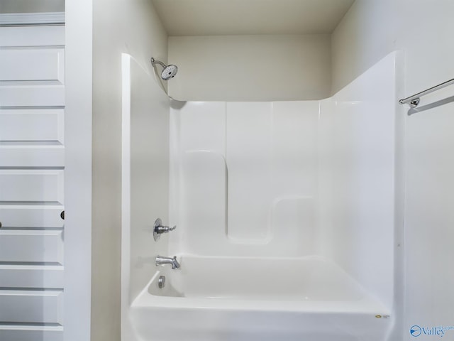 bathroom featuring  shower combination