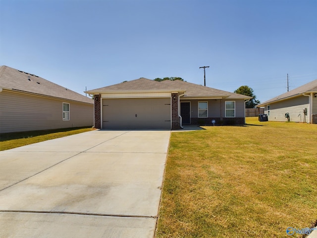 ranch-style home with a garage and a front yard