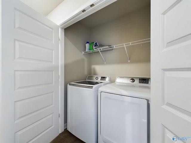 laundry room with separate washer and dryer