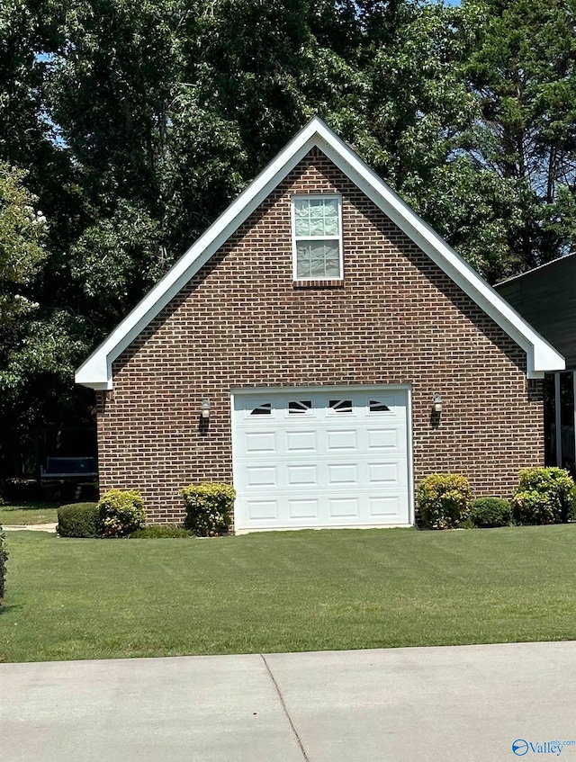 view of property exterior with a garage and a yard