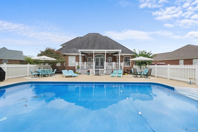 view of pool with a patio and a gazebo