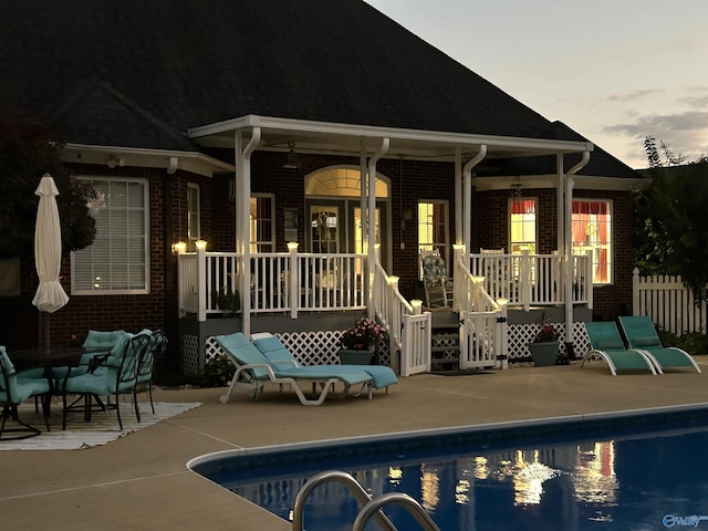 2224 Veranda Trce, Gadsden, AL 35903 - rear view of property featuring brick siding, fence, an outdoor pool, and a patio area