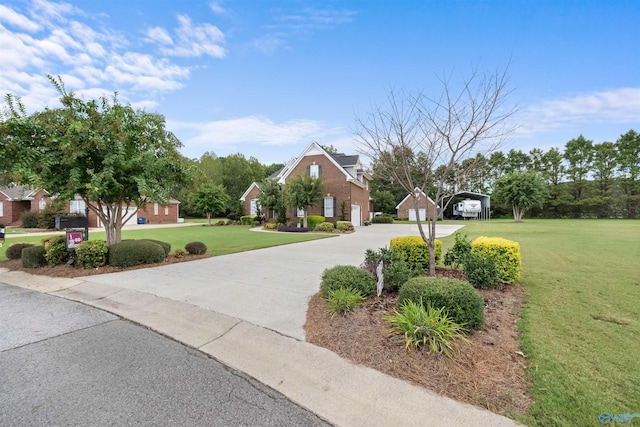 2224 Veranda Trce, Gadsden, AL 35903 - traditional-style home with concrete driveway, a front lawn, and a residential view