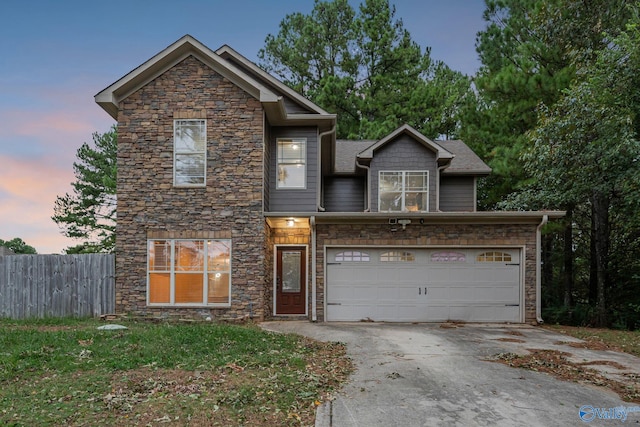 view of front of home with a garage