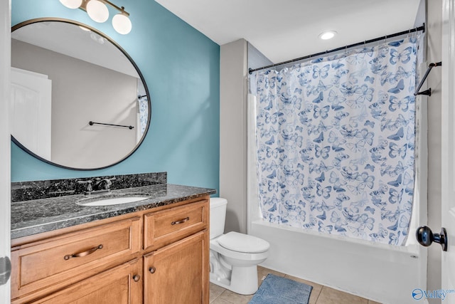 full bathroom with vanity, tile patterned floors, toilet, and shower / bath combo