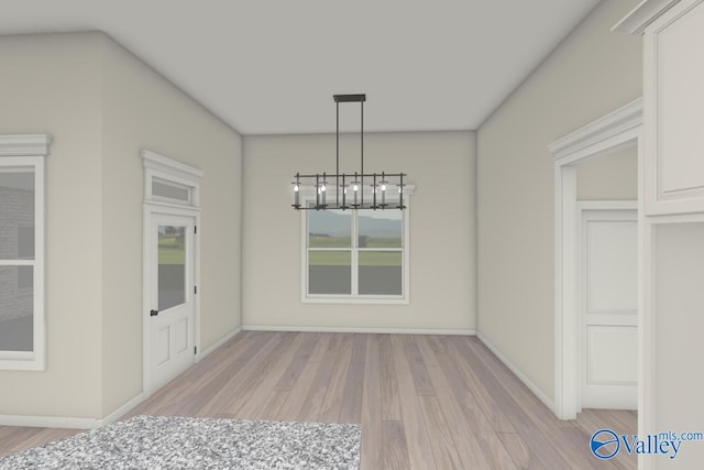 unfurnished dining area with an inviting chandelier and light wood-type flooring