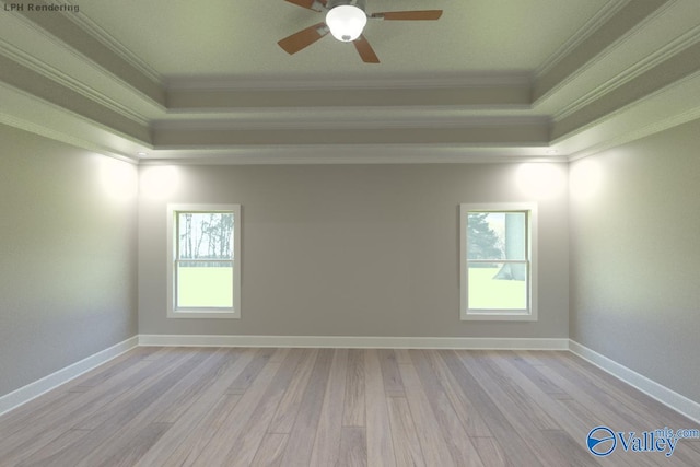 spare room featuring crown molding, a raised ceiling, ceiling fan, and light wood-type flooring