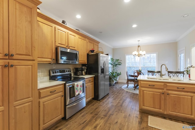 1033 Edgewood Cir, Arab, AL 35016 - kitchen with dark wood finished floors, ornamental molding, light countertops, a sink, and stainless steel appliances