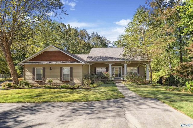 1033 Edgewood Cir, Arab, AL 35016 - view of front of house featuring a front yard and covered porch