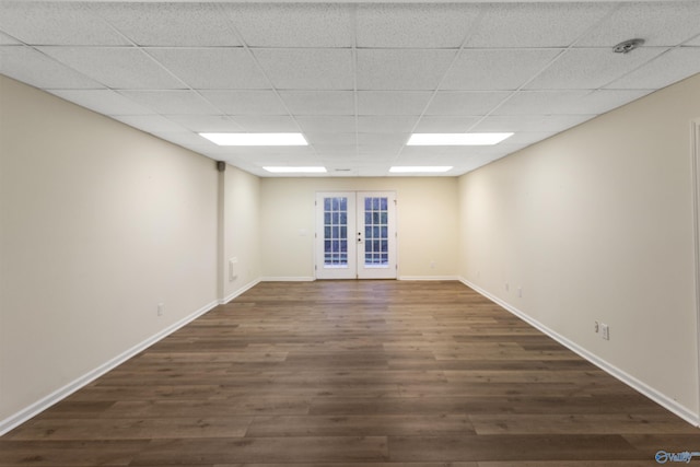 1033 Edgewood Cir, Arab, AL 35016 - spare room featuring french doors, baseboards, a drop ceiling, and dark wood finished floors