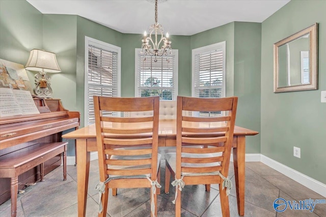 dining room featuring a chandelier