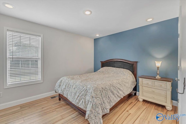 bedroom featuring light wood-type flooring