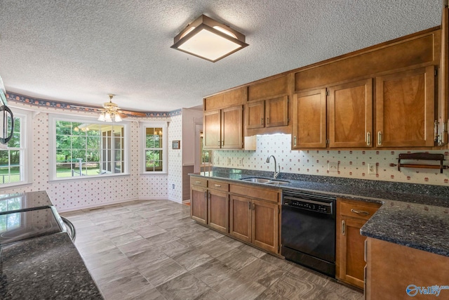 114 Butch Cir, Hazel Green, AL 35750 - kitchen with black dishwasher, wallpapered walls, a textured ceiling, brown cabinets, and electric range oven