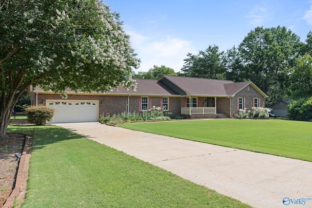 114 Butch Cir, Hazel Green, AL 35750 - ranch-style house with brick siding, a garage, a front yard, concrete driveway, and covered porch