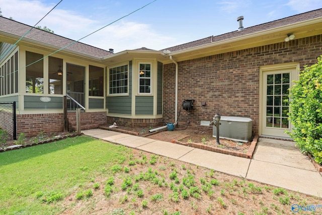 114 Butch Cir, Hazel Green, AL 35750 - view of exterior entry featuring brick siding and a yard