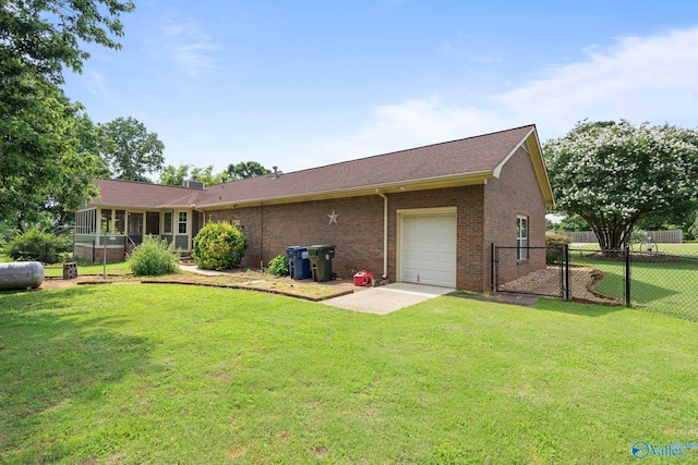 114 Butch Cir, Hazel Green, AL 35750 - view of front of home with an attached garage, brick siding, and a shingled roof