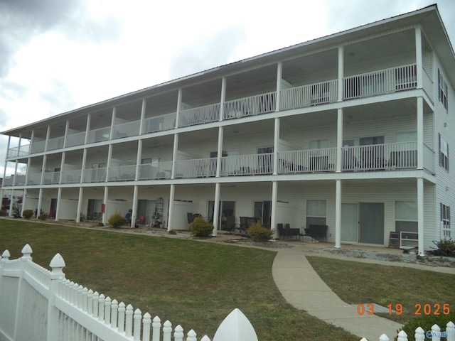 view of property with fence