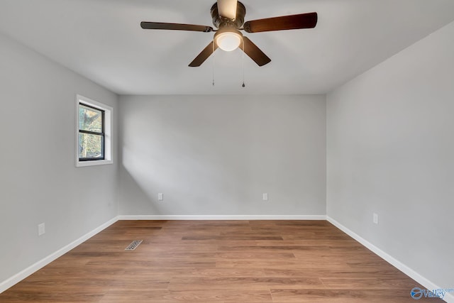 unfurnished room with ceiling fan and light hardwood / wood-style floors