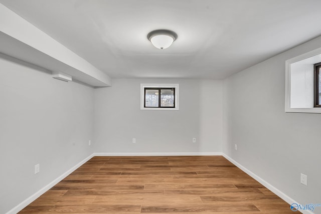 basement featuring light hardwood / wood-style floors