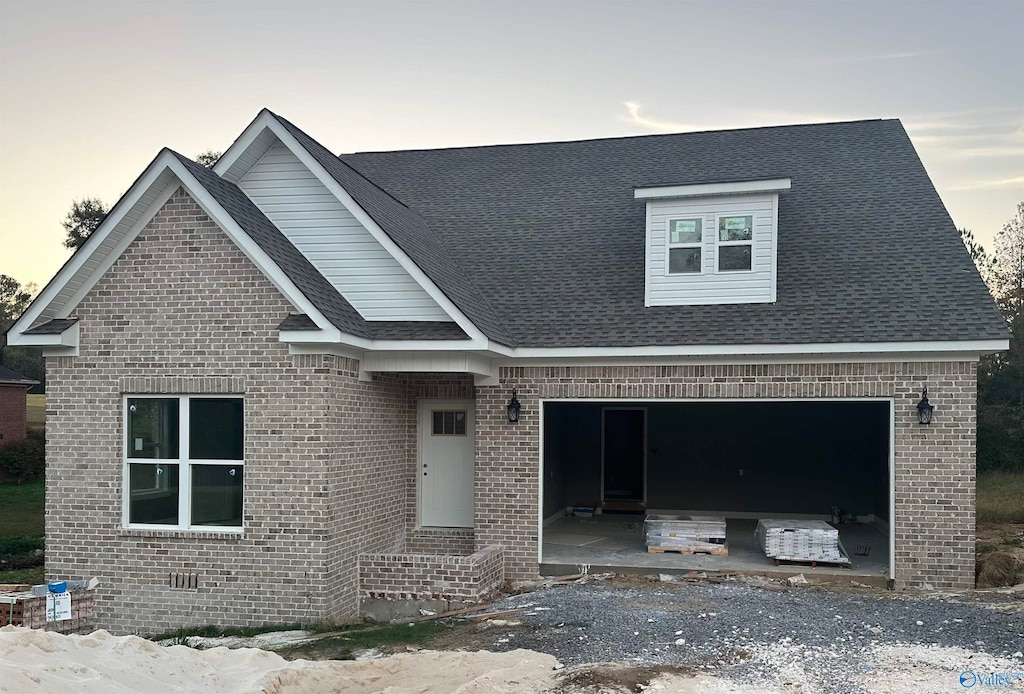 view of front of home with a garage