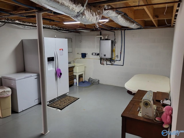 unfinished basement featuring water heater, white fridge with ice dispenser, and refrigerator