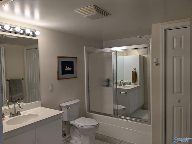 full bath featuring visible vents, toilet, tile patterned floors, an enclosed shower, and vanity