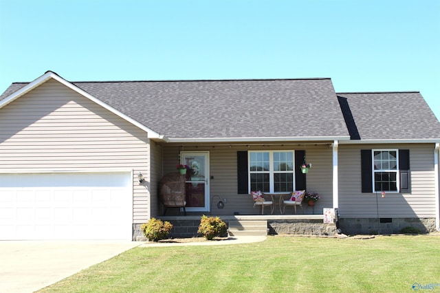 view of front facade featuring a porch, an attached garage, a shingled roof, and a front lawn