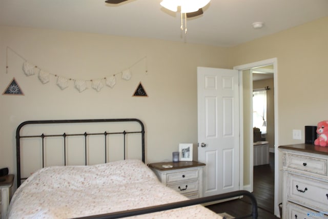 bedroom with a ceiling fan and wood finished floors