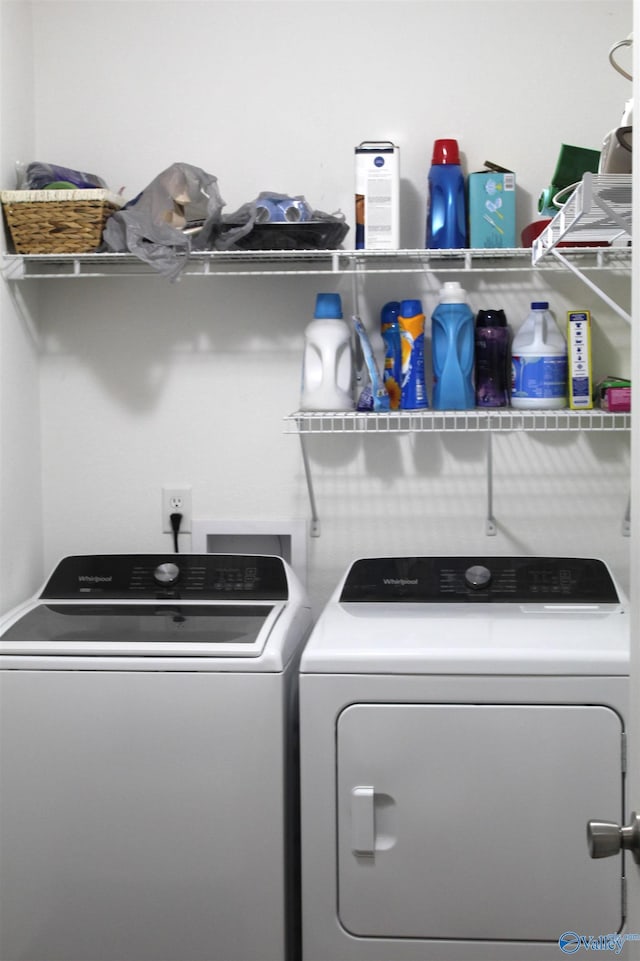 laundry area with independent washer and dryer and laundry area