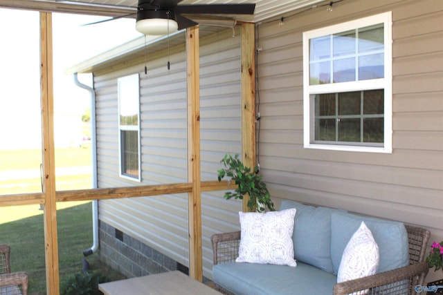 wooden deck featuring ceiling fan