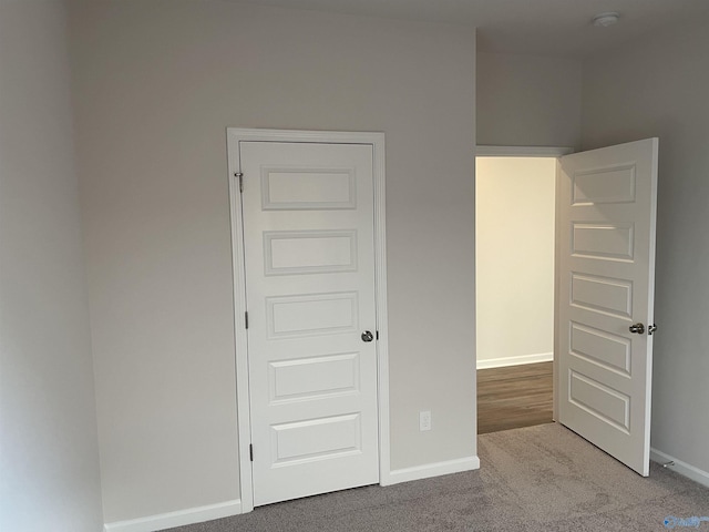 unfurnished bedroom featuring carpet floors