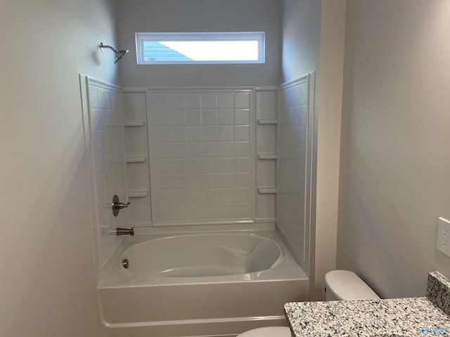 full bathroom with vanity, toilet, and washtub / shower combination